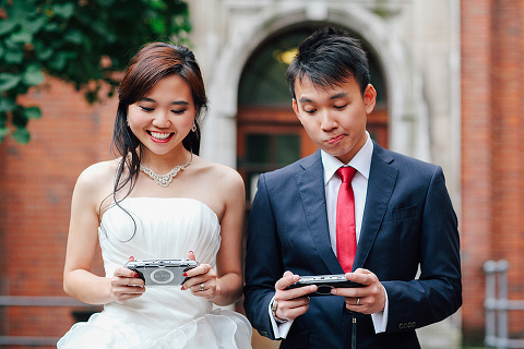 engagement pre wedding photographer London Kensington Natural history museum rainy day couple